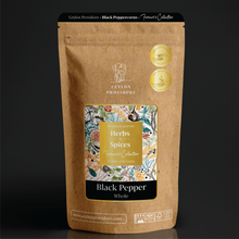 Load image into Gallery viewer, Buy ceylon black peppercorns online on www.ceylonprovidore.com. The pepper is sourced ethically, fresh and packaged in eco-friendly bags. front view of packaging.

